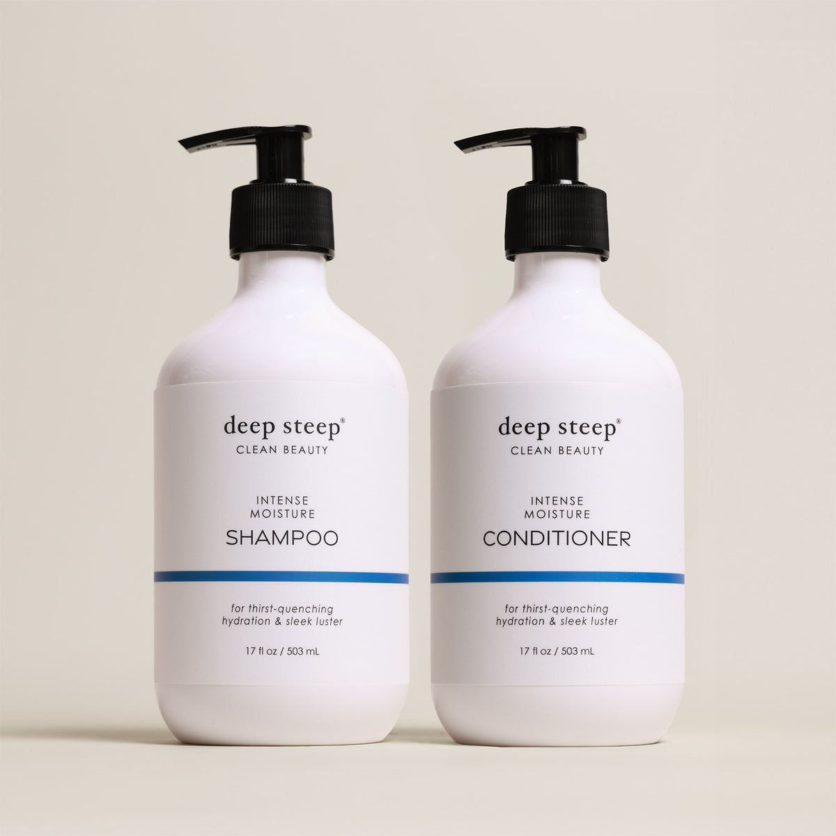 Two bottles of Deep Steep Intense Moisture Shampoo and Conditioner, 17 fl oz bottles with pumps, on a beige background