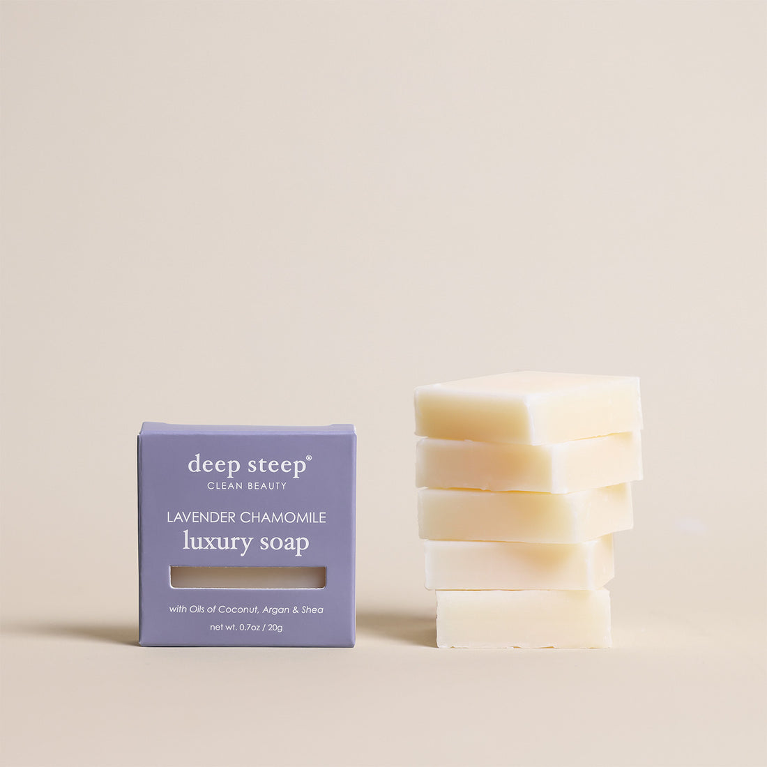 Deep Steep Lavender Chamomile luxury soap bar, 0.7 oz net weight, next to its packaging box made with coconut, argan, and shea oils, 5 Pack
