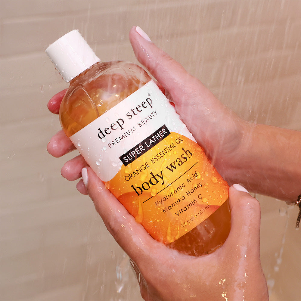 Deep Steep Super Lather Orange Essential Oil Body Wash, 17 fl oz bottle with hyaluronic acid, manuka honey, and vitamin C