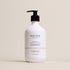 Deep Steep Argan Oil Hydrating Volume Shampoo, 17 fl oz bottle with a pump, on a beige background