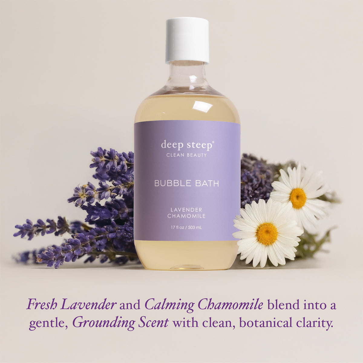 A bottle of Deep Steep Clean Beauty Bubble Bath in Lavender Chamomile scent, styled with fresh lavender sprigs and chamomile flowers on a light beige background with a descriptive text overlay at the bottom.