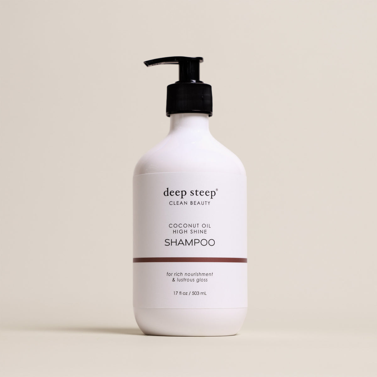 Deep Steep Coconut Oil High Shine Shampoo, 17 fl oz bottle with a pump, on a beige background