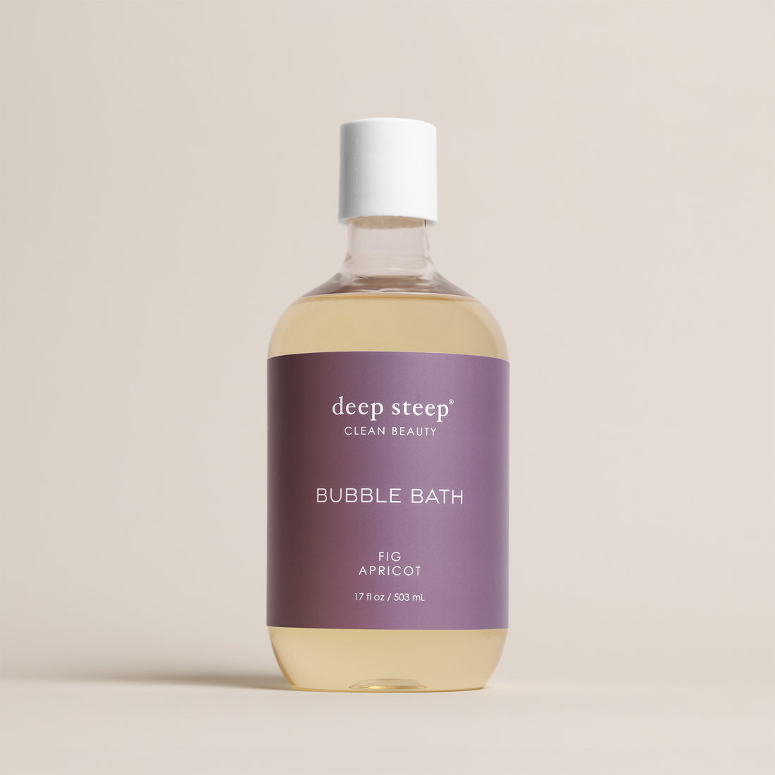Deep Steep Fig Apricot Bubble Bath, 17 fl oz hypoallergenic bottle with an orange label on a neutral background