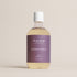Deep Steep Fig Apricot Bubble Bath, 17 fl oz hypoallergenic bottle with an orange label on a neutral background
