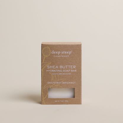 7 oz Deep Steep Grapefruit Bergamot hydrating bar soap containing 40% shea butter in a box on a beige background