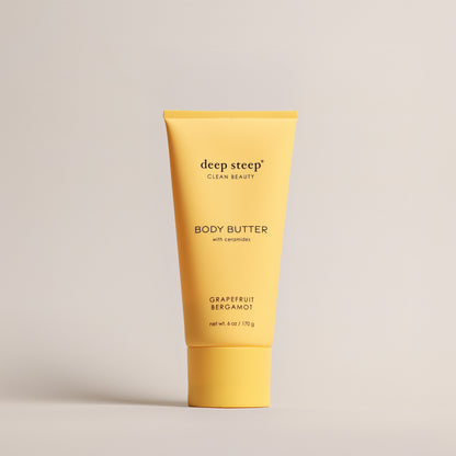 Deep Steep Grapefruit Bergamot Body Butter, 6 oz tube, featuring ceramides on a beige background