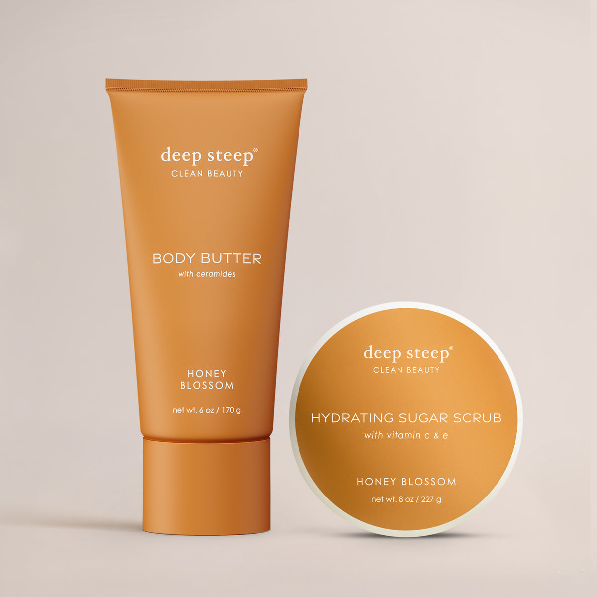 Deep Steep Honey Blossom Body Butter and Sugar Scrub bundle featuring 8 oz hydration scrub and moisturizing body butter against a neutral background
