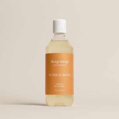 Deep Steep Honey Blossom Bubble Bath, 10 fl oz hypoallergenic bottle on a neutral background