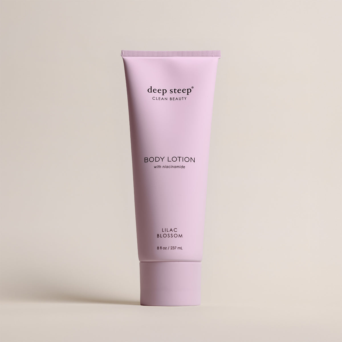Deep Steep Lilac Blossom Body Lotion, 8 fl oz tube, featuring niacinamide on a beige background