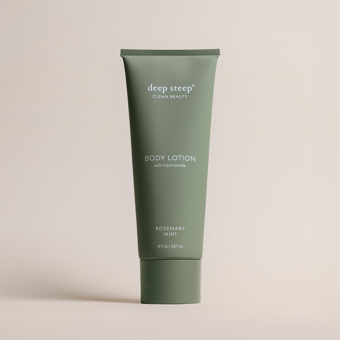 Deep Steep Rosemary Mint Body Lotion, 8 fl oz tube, featuring niacinamide on a beige background