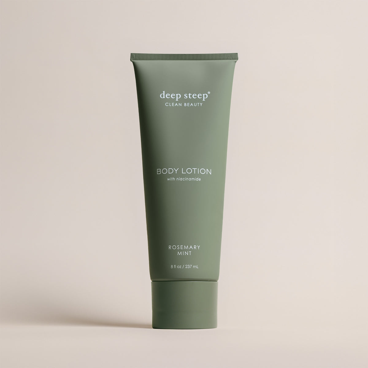 Deep Steep Rosemary Mint Body Lotion, 8 fl oz tube, featuring niacinamide on a beige background
