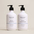 Two bottles of Deep Steep Weightless Moisture Shampoo and Conditioner, 17 fl oz bottles with pumps, on a beige background